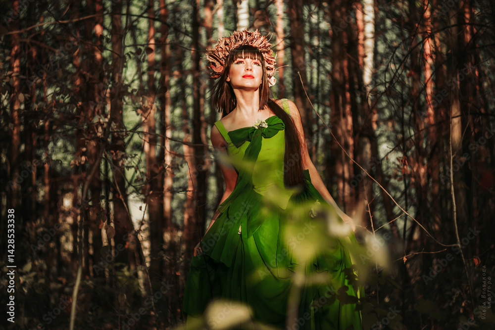 Beautiful girl in a dress in the forest Beautiful girl in a dress in the forest