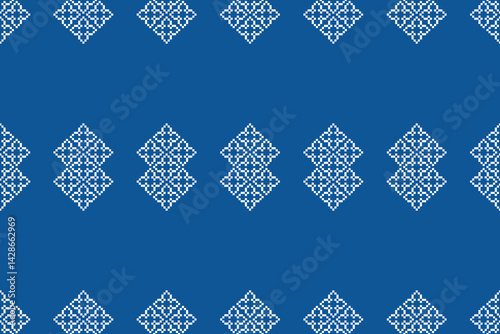 Ethnic pattern traditional motif ikat geometric fabric pattern cross stitch.Ikat embroidery Ethnic oriental Pixel blue background.Abstract,vector,illustration. Texture,decoration,wallpaper.