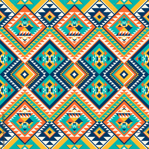 Vibrant tribal pattern with geometric diamond motifs in teal orange yellow and navy. Bold Aztec inspired design perfect for fashion textiles and home decor products.