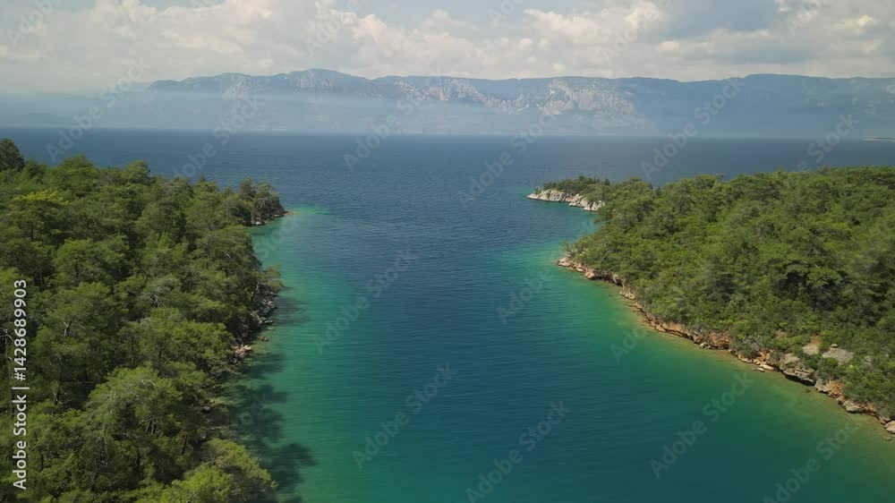 High view of Karaca Bay exit with forested coast in Turkey High view of Karaca Bay exit with forested coast in Turkey