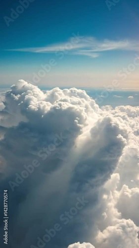 Cinematic Aerial Fly-Through of Cumulus Clouds at Sunrise in a Clear Blue Sky