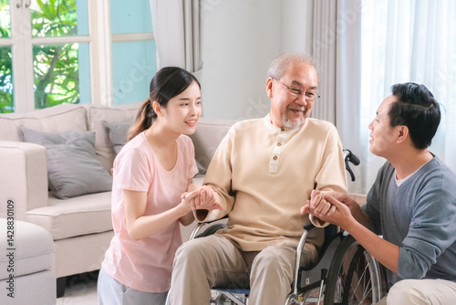 Asian family supporting their elderly loved one with care and compassion at home, symbolizing the importance of health insurance, life coverage, and family unity in aging with dignity and security