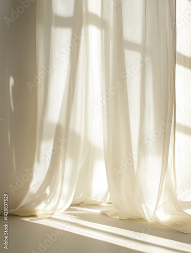 Sunlight streaming through sheer white curtain casting geometric shadows on wall and floor