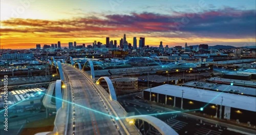 Timelapse of Bridge at sunset captures the citys iconic skyline, ideal for travel websites, blogs, and cityscapethemed designs. Sunset over Los Angeles bridge skyline travel.