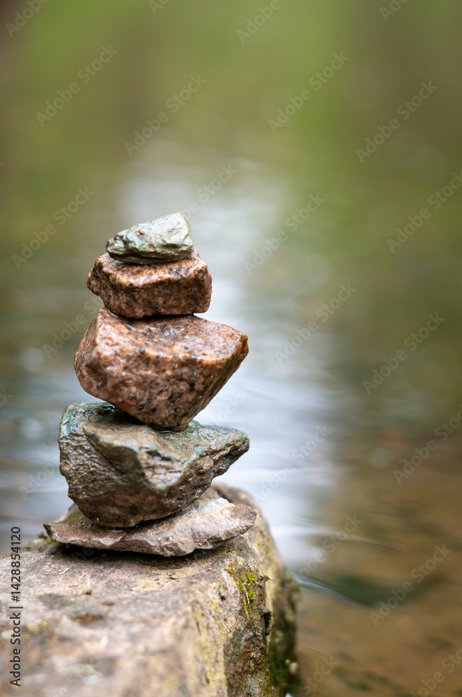 balance stones on the water Zen Like vertical