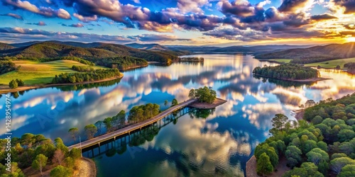 Wallpaper Mural Serene Sunset Reflection on a Still Lake with a Winding Road and Bridge Torontodigital.ca