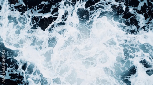 Closeup of tide rushing between rocks, abstract captured velocity
