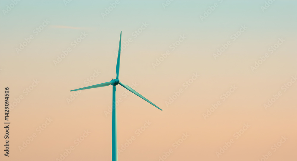 Fototapeta premium Single Wind Turbine Spinning Silently Against Pastel Peach and Teal Sunset Sky Creating Clean Energy