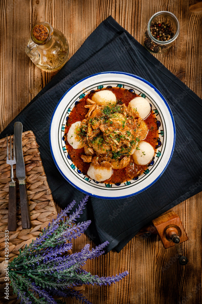Dumplings with turkey and chorizo sauce.