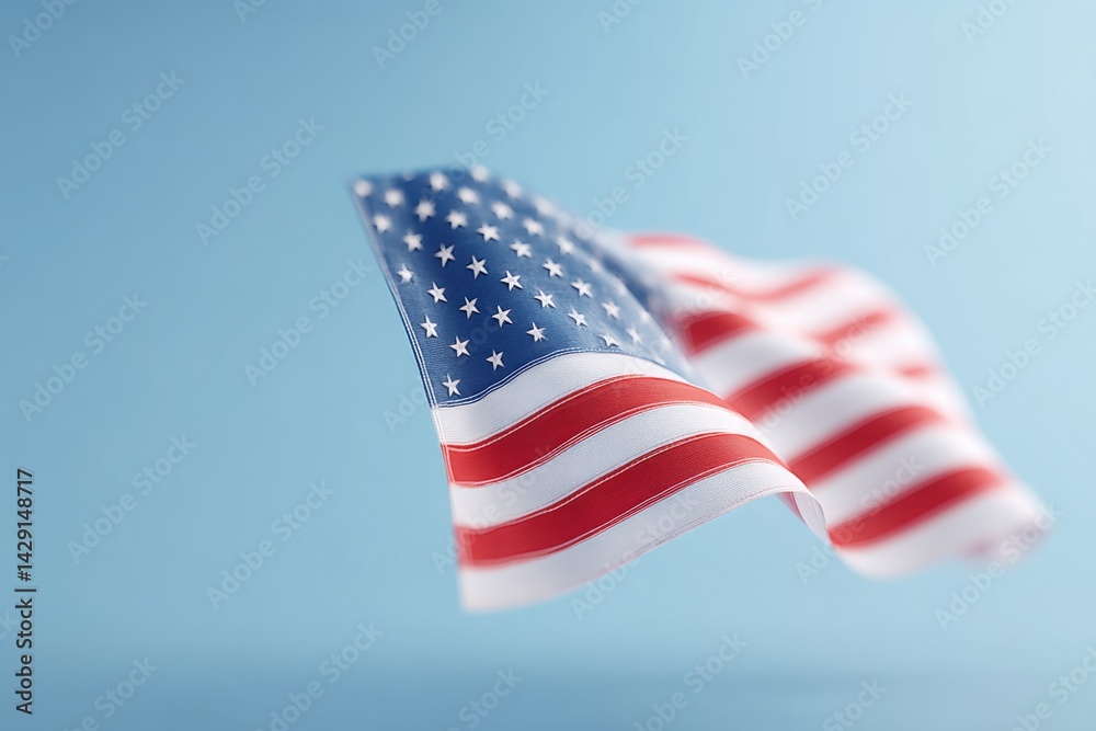 Obraz premium close-up of usa flag waving gently over clear blue sky