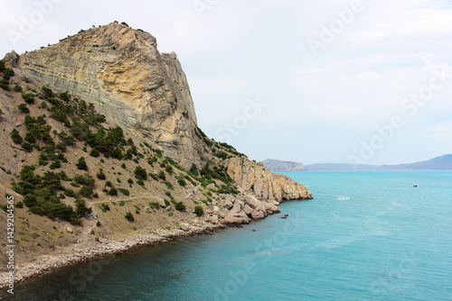 Rocky coastline meeting turquoise waters in crimea