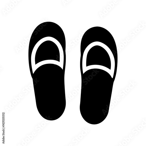 Pair of black flip flops or slippers isolated on a white background