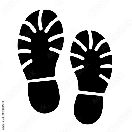Black footprints with radial treads illustrating walking, tracks, and directionality
