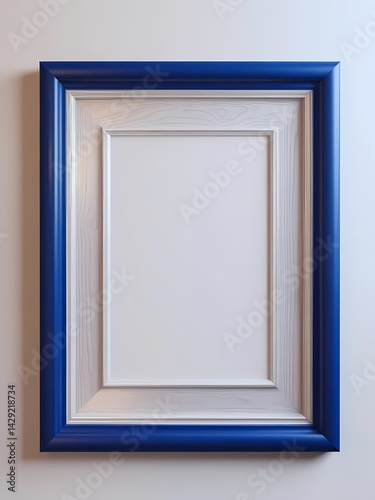 Obraz na płótnie Decorative blue and white frame placed against a neutral wall w salonie
