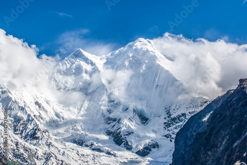 Rakaposhi peak at 7,788 meters above sea level in the Karakoram mountains range in the Gilgit Baltistan region of Pakistan photo