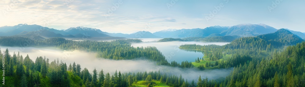 Naklejka premium Tranquil lakeside retreat, a breathtaking view of nature's serenity serene