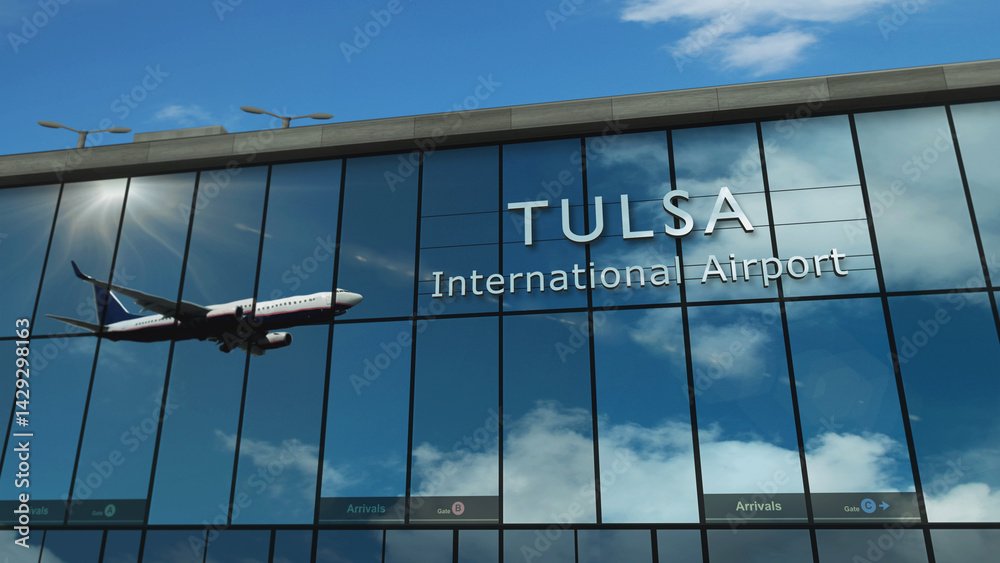 Airplane landing at Tulsa Oklahoma, USA, airport mirrored in terminal