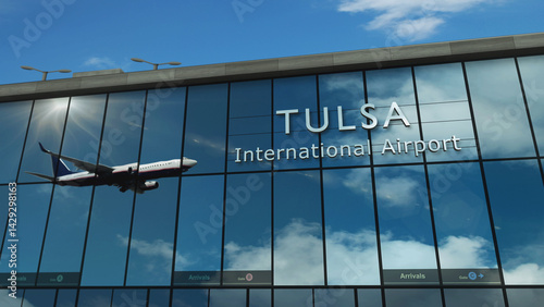 Obraz na płótnie Airplane landing at Tulsa Oklahoma, USA, airport mirrored in terminal w salonie