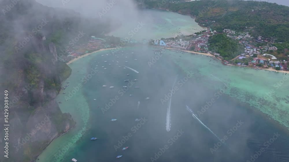 Ko Phi Phi Don rises from the Andaman Sea with beauty, Thailand. Aerial drone video