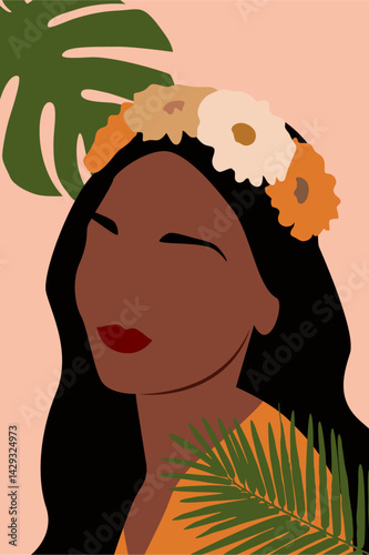 Boho portrait of a beautiful young girl with flowers in her hair and tropical leaves