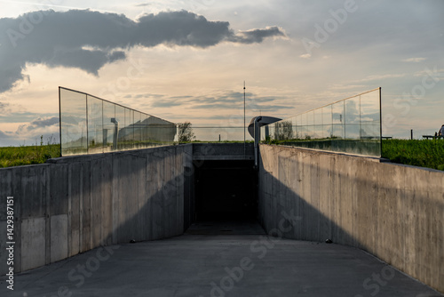 Fototapeta Naklejka Na Ścianę i Meble -  Large garage entrance underground passage for parking cars in exclusive property