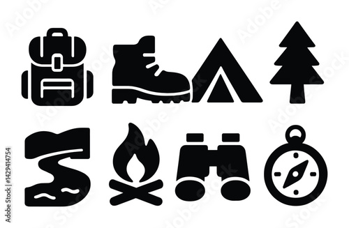 Outdoor adventure solid icons set – filled style icons for camping and hiking enthusiasts: backpack, hiking boots, tent, pine tree, river, campfire, binoculars, compass.