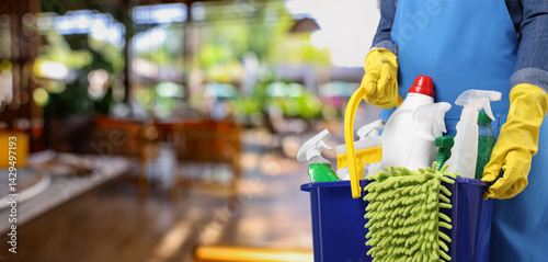 Obraz na płótnie Woman with different cleaning supplies and products at outdoor cafe, closeup. Banner design with space for text w salonie