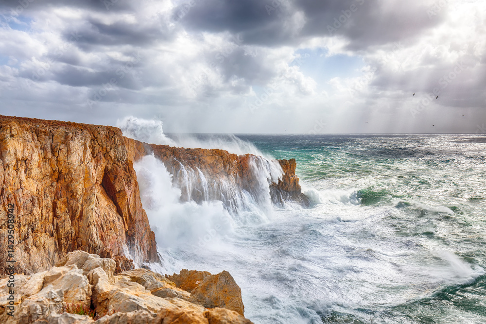 Unbelivable view of cliffs in valley Cala Domestica and storm on the sea