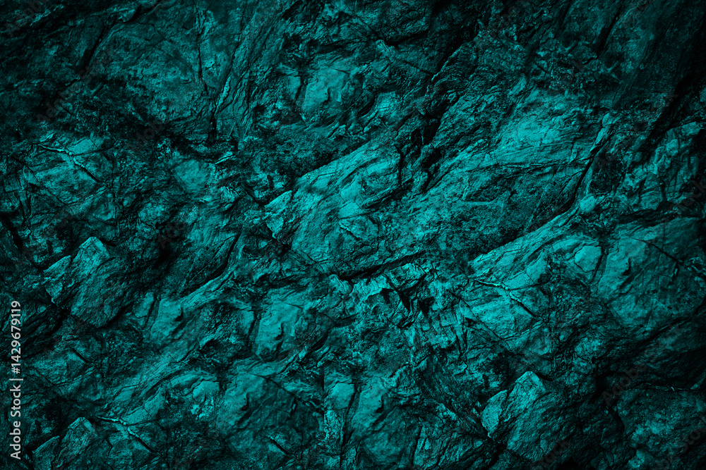 Black dark blue green gray teal aqua turquoise rough mountain surface. Close-up. Toned stone rock mineral granite texture background. Cracked crumbled. Underwater water. Or ice frost effect.