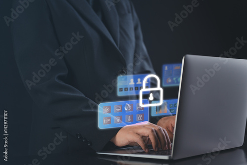 digital visualization of a businessman's hand activating firewall and cyber monitoring icons on virtual data panels to demonstrate proactive cybersecurity and information protection