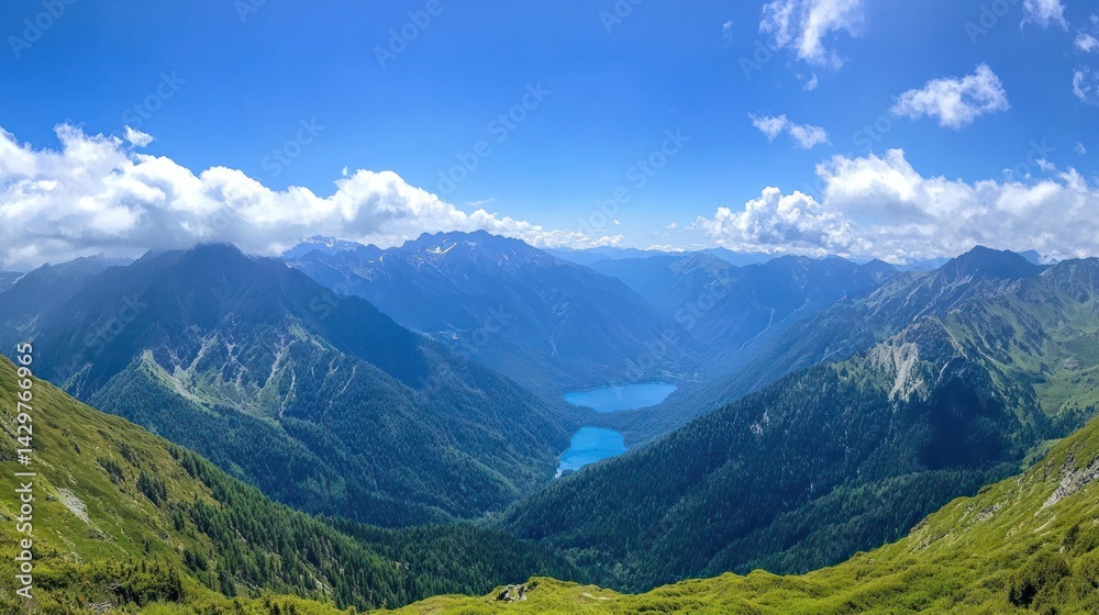 Fototapeta premium Lake in mountains panorama under blue sky with clouds, perfect for travel and nature