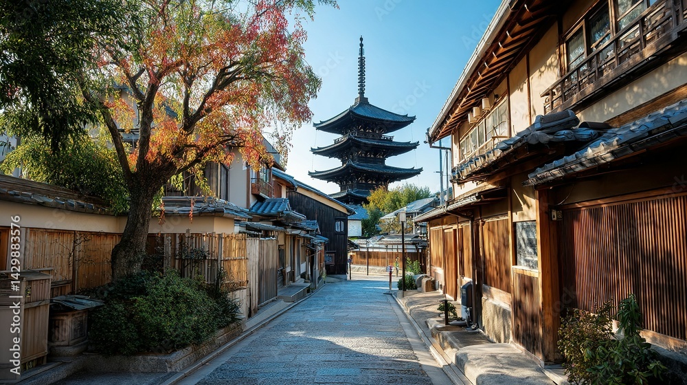 Fototapeta premium Scenic japanese alleyway with pagoda and autumn foliage.