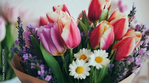 A Beautiful Flower Bouquet Featuring Lovely Tulips and Cheerful Daisies in Harmony