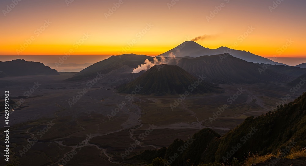 Naklejka premium Volcanic Peaks at Dawn: Steaming Craters & Golden Horizon.