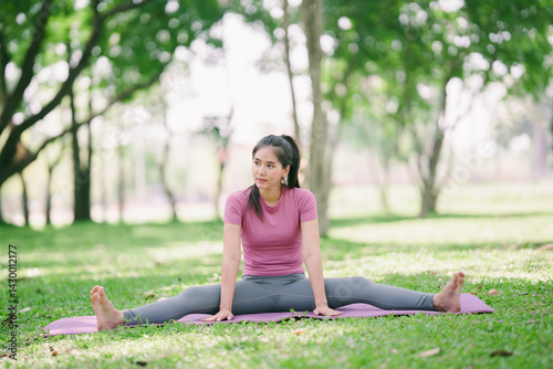 Photography Beautiful Asian woman practicing yoga pose Utthita Trikonasana