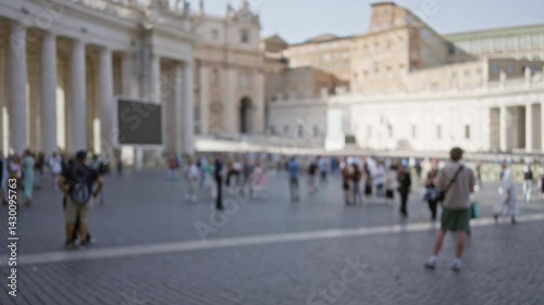 Wallpaper Mural Blurred tourists walk in st. peter's square, vatican city, capturing the historic architecture in a defocused background under clear skies in italy. Torontodigital.ca