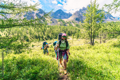 Mother and sons hikers adventuring trip in the back country. The silence around me awakens senses. Some of best life memories are hikes.