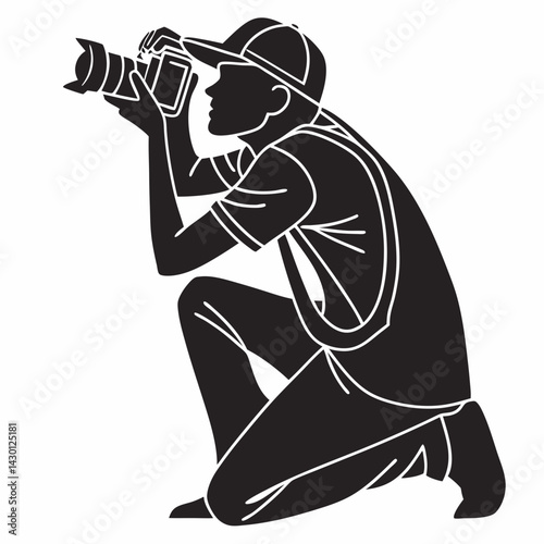 Black Silhouette Of A Photographer Kneeling And Taking Pictures Attentively With A Camera