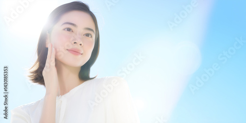 太陽の光を浴びる若い女性のポートレート
