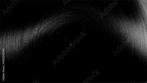 Abstract dark texture background with concentric brushed metal effect. Ideal for use in industrial design, technology themes, or as a minimal backdrop