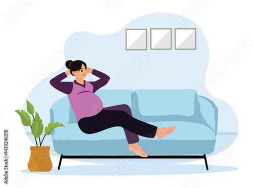 Pregnant woman sitting relaxed on the sofa.