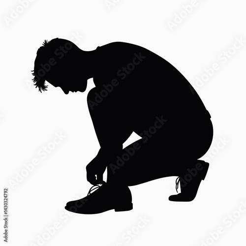 man tying shoe laces  silhouette style