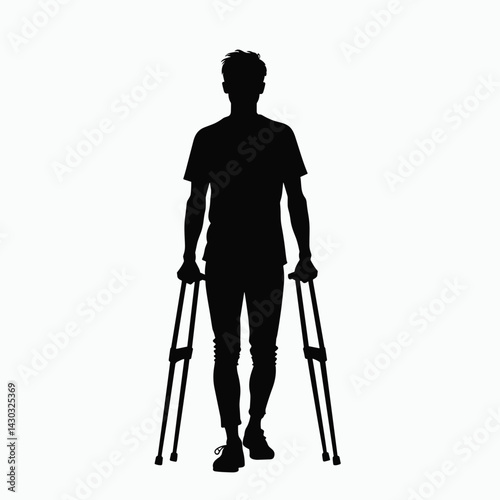 silhouette of man with crutches