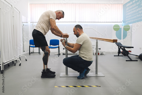 Prosthetist and an amputee collaborate during a personalized prosthetic fitting session