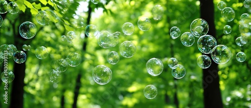 Obraz na płótnie Bubbles floating amid lush greenery create a serene and enchanting atmosphere in nature. w salonie