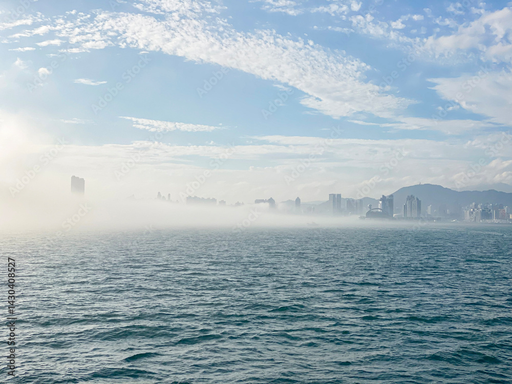 Cityscape Emerging from Fog in Hong Kong