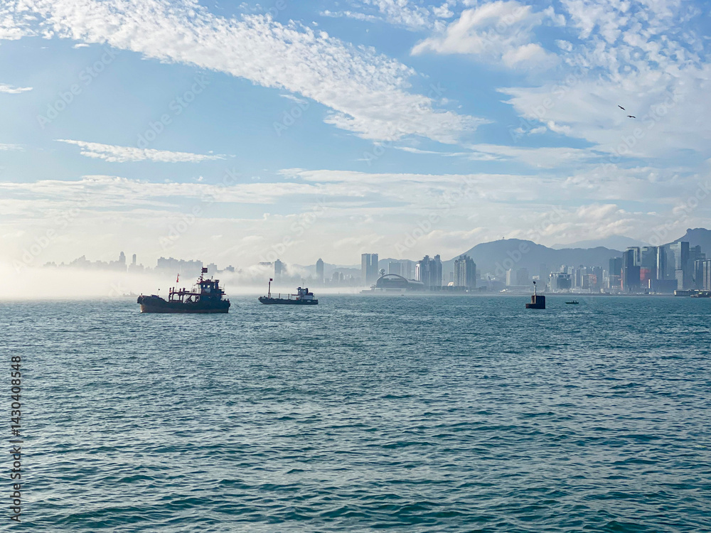 Cityscape Emerging from Fog in Hong Kong