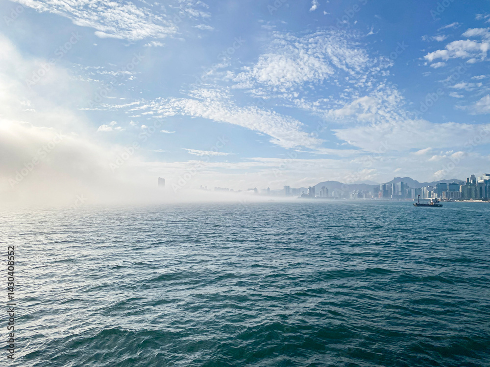 Cityscape Emerging from Fog in Hong Kong