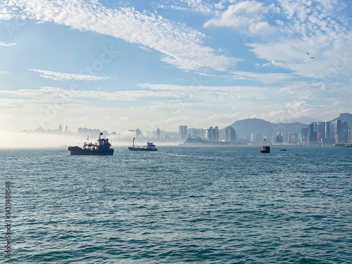 Obraz na płótnie Cityscape Emerging from Fog in Hong Kong w salonie