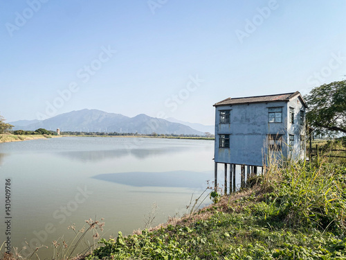 Obraz na płótnie Rural Landscape with Dilapidated House by a Pond in Hong Kong w salonie